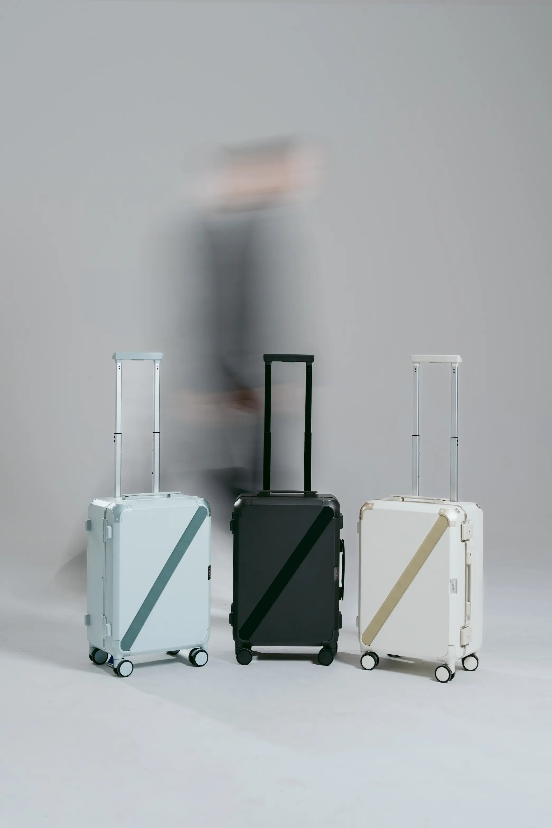 Three armoir cabin of different colors on a gray background