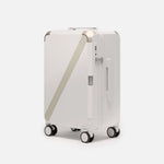 Beige premium carry-on luggage, The Cabin Trunk Essential by Armoir, front angle view