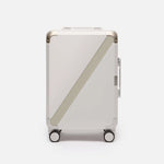 Beige hard shell carry-on suitcase, The Cabin Trunk Essential by Armoir, front view
