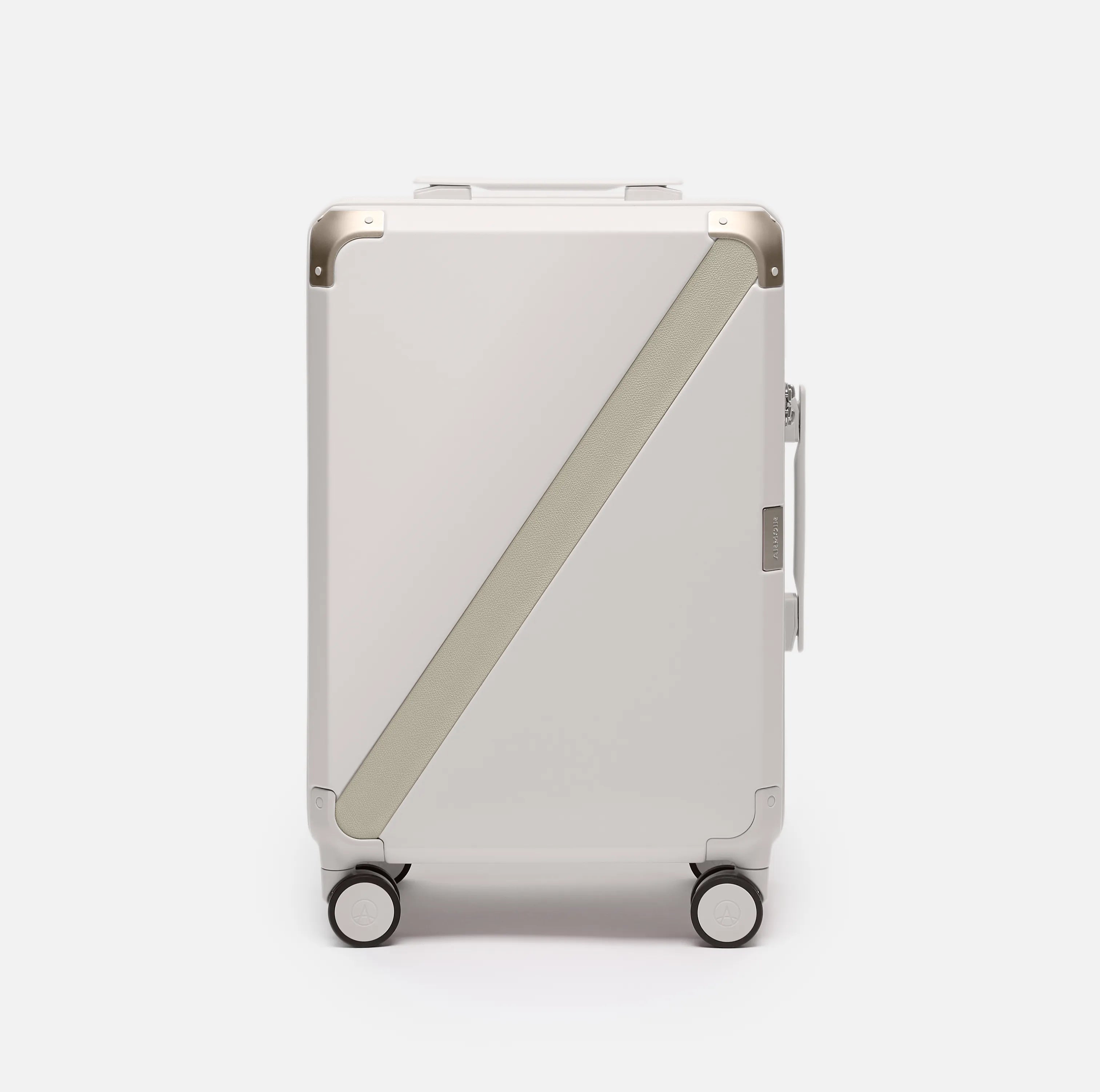 Beige hard shell carry-on suitcase, The Cabin Trunk Essential by Armoir, front view