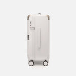 Beige carry-on suitcase, The Cabin Trunk Essential by Armoir, side profile