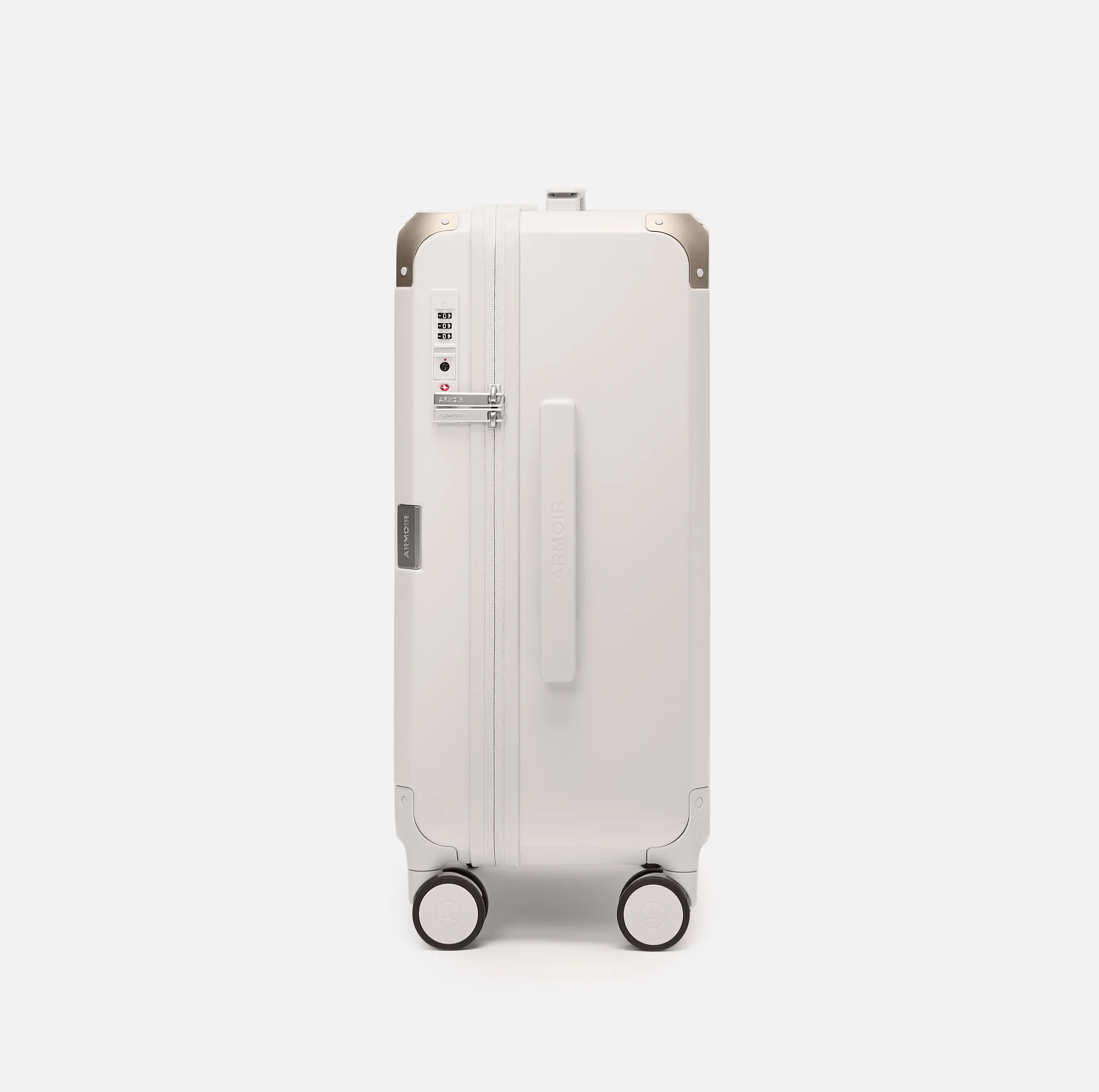 Beige carry-on suitcase, The Cabin Trunk Essential by Armoir, side profile