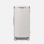 Beige hard shell checked suitcase, The Large Trunk Essential by Armoir, rear angle view