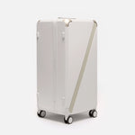 Beige premium checked luggage, The Large Trunk Essential by Armoir, front angle view